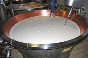 Warming the milk in copper kettles